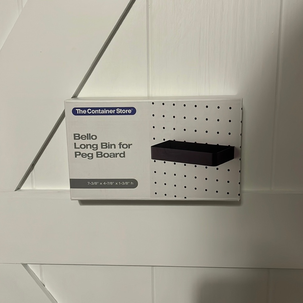 Container for a peg board
